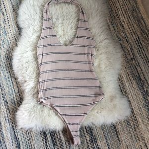 Ribbed and striped tan onesie